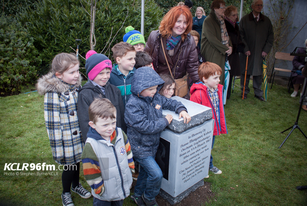Relatives of Nurse Margaret Keogh stand at her plaque. Pic Stephen Byrne/KCLR