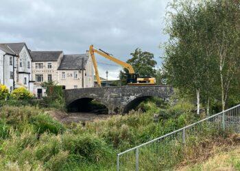 Works underway on clearing under bridge in County Kilkenny town