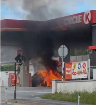 Staff at garage on Kilkenny city outskirts quick to react when car on forecourt went on fire