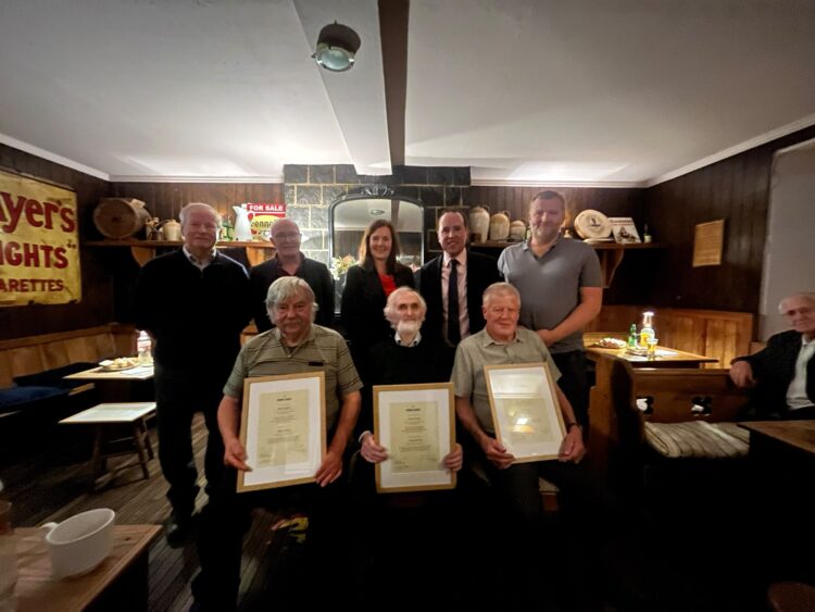 Minister of State John Cummins stops off in county Kilkenny town to celebrate four local men